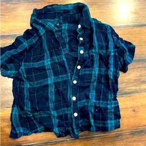 Shortsleeved cropped button-up lightweight flannel.